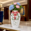 HD270-Premium-White-Porcelain-Oval-Narrow-Neck-Vase-with-Raised-Floral-Design-and-Cutouts-Pattern-1