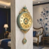 WC684-Green-Luxury-Ornate-Pendulum-Wall-Clock-with-Ceramic-Body-and-Golden-Metal-Accents-1