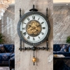 WC781-1-Grand European Vintage Rotating Gear Wall Clock with Ornate Black Metal Frame and Roman Numerals (2)